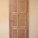 Porta in rovere massello con profili in acero